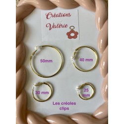 Créoles et boucles d'oreilles .