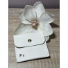 Pochette à bijoux simili cuir .