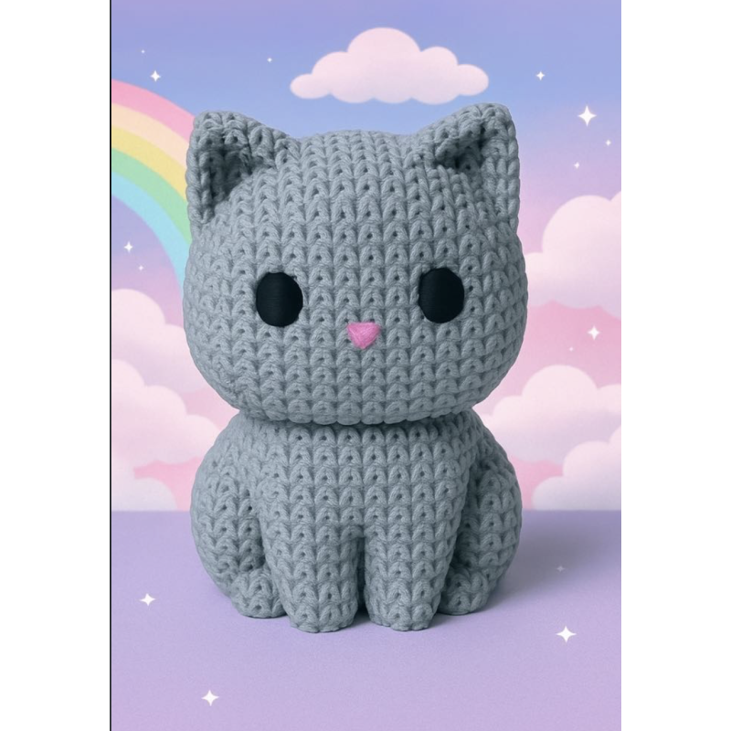 Petit chat tricot gris .